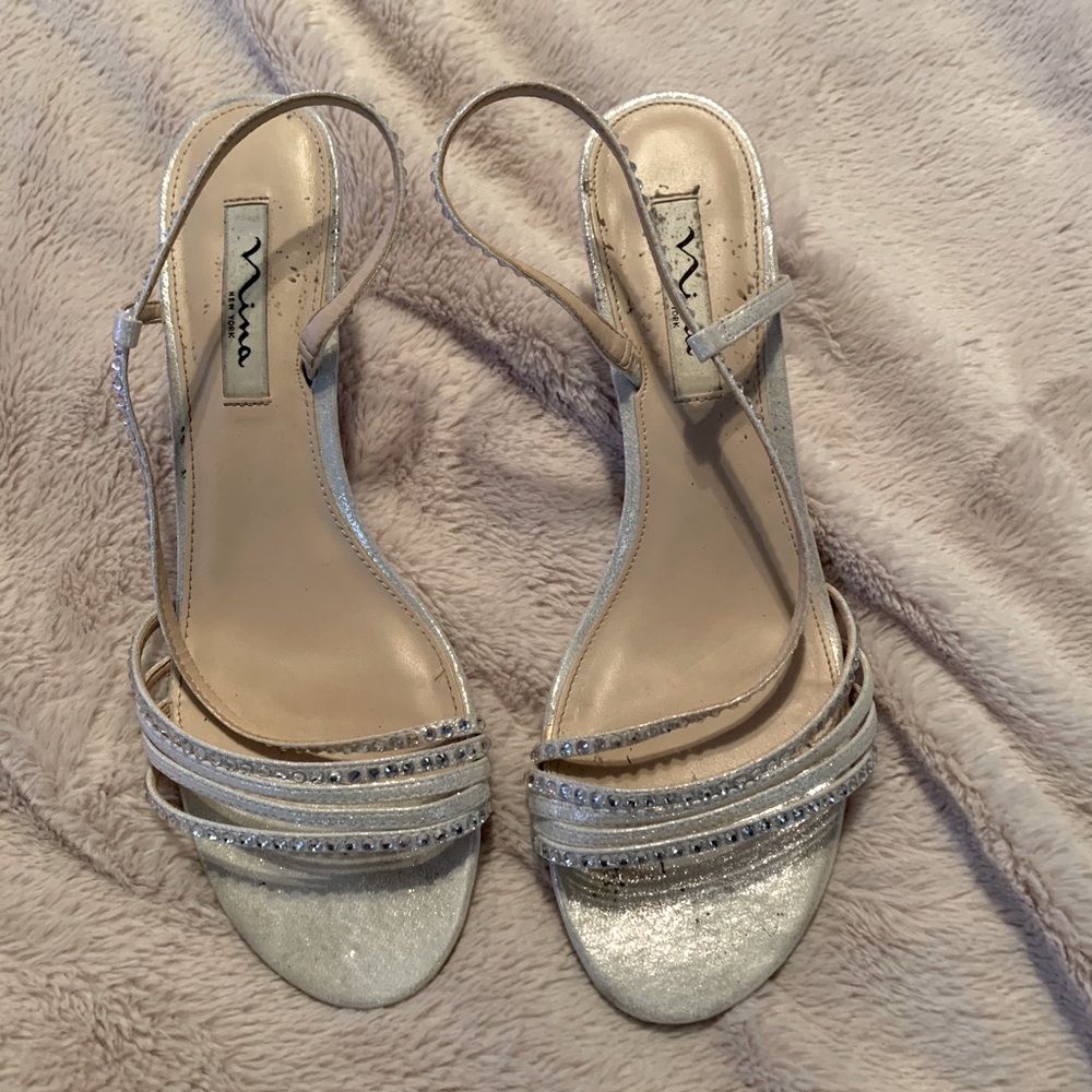 Nina New York silver slip on 1 1/2 inch heels